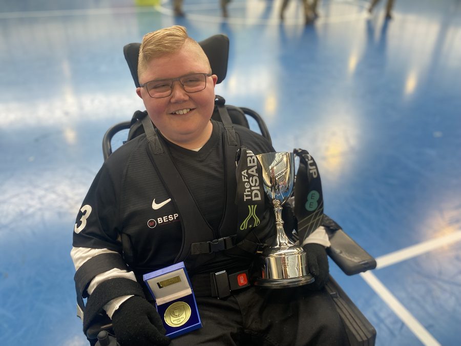 Logan Mitchelson with the FA Disability Cup and his Man of the Match medal